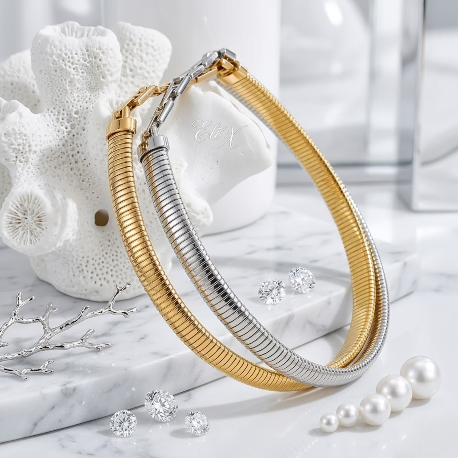 BEHI ALMOND 18k PVD gold-plated stainless steel choker necklace with a ridged surface and a hinge-link detail shiny gold and silver finish.