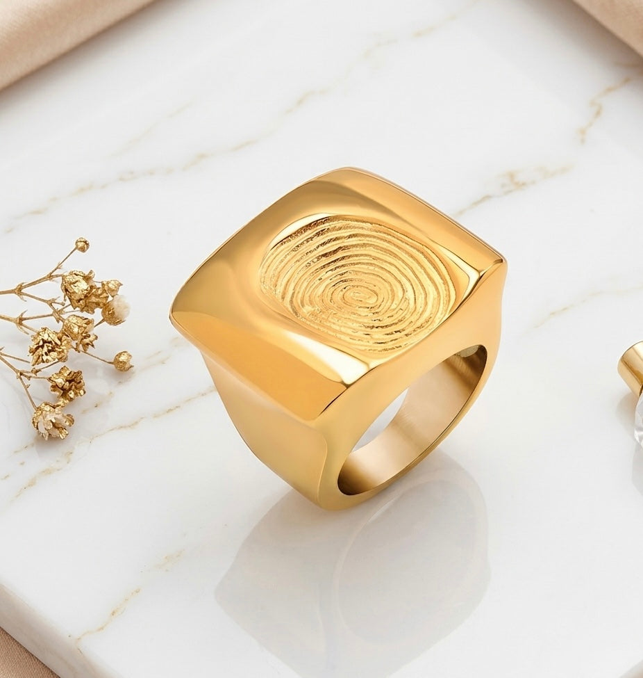 BEHI SIGNATURE 18k PVD gold-plated hypoallergenic fingerprint ring with a textured surface.