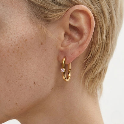 BEHI Eva Earrings | 18k PVD gold-plated stainless steel minimal hoop earrings with a single clear Zircon gemstone set at the center of each hoop | Waterproof, Hypoallergenic and Tarnish-free