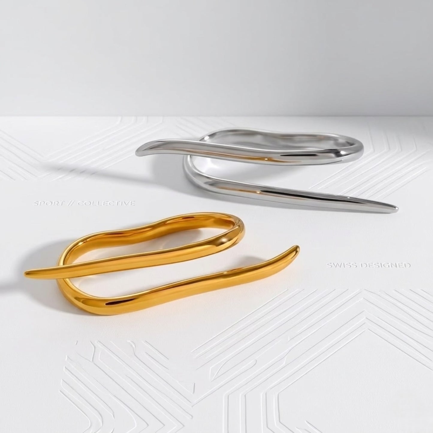 BEHI DAISY 18k PVD gold plated, freeform and asymmetric dual finger ring with a smooth, polished gold and silver finish.