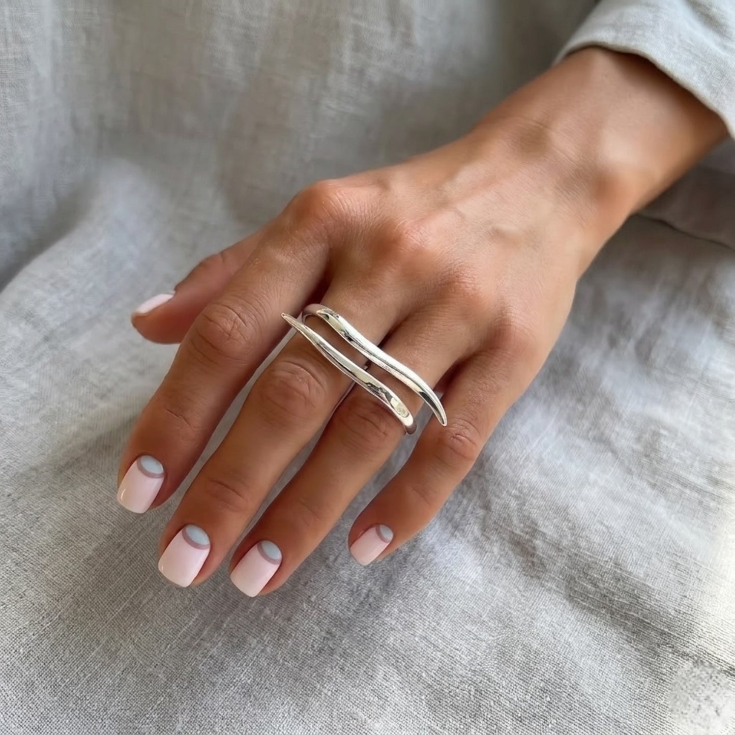 BEHI DAISY 18k PVD gold-plated, freeform and asymmetric dual finger ring with a smooth, polished finish, hypoallergenic.