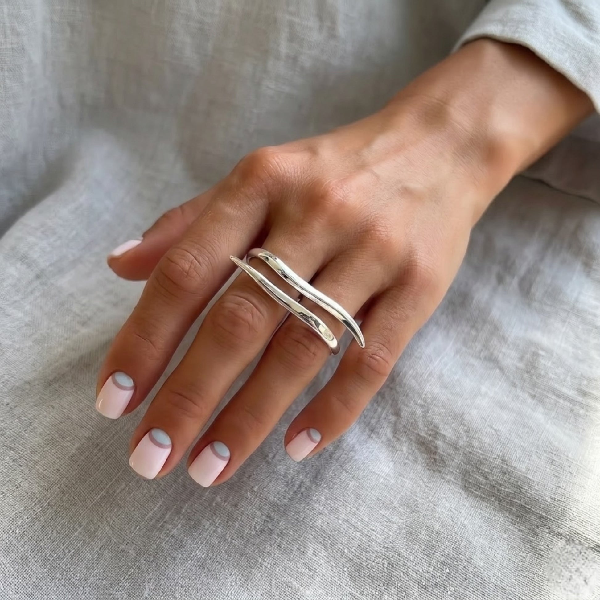 BEHI DAISY 18k PVD gold-plated, freeform and asymmetric dual finger ring with a smooth, polished finish, hypoallergenic.