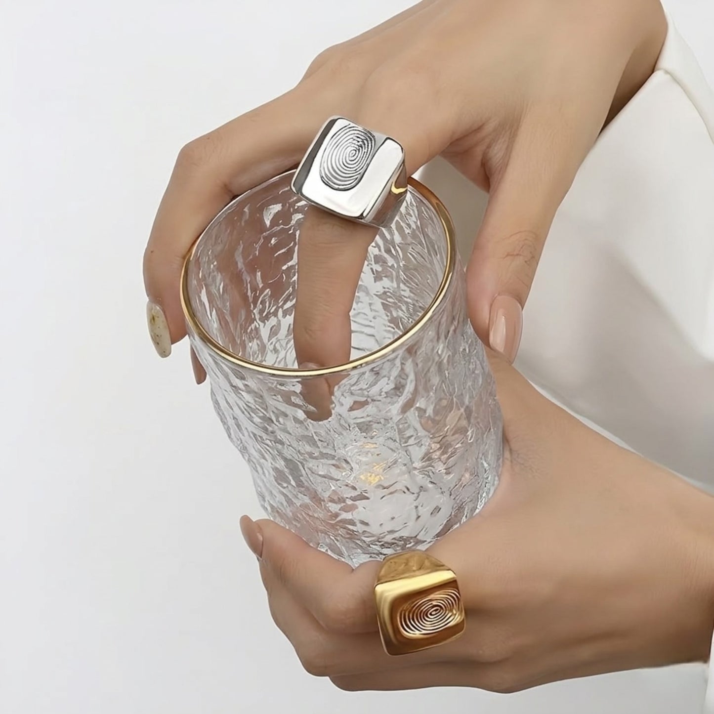 BEHI SIGNATURE 18k PVD gold plated waterproof fingerprint ring with a textured surface in gold and silver color.