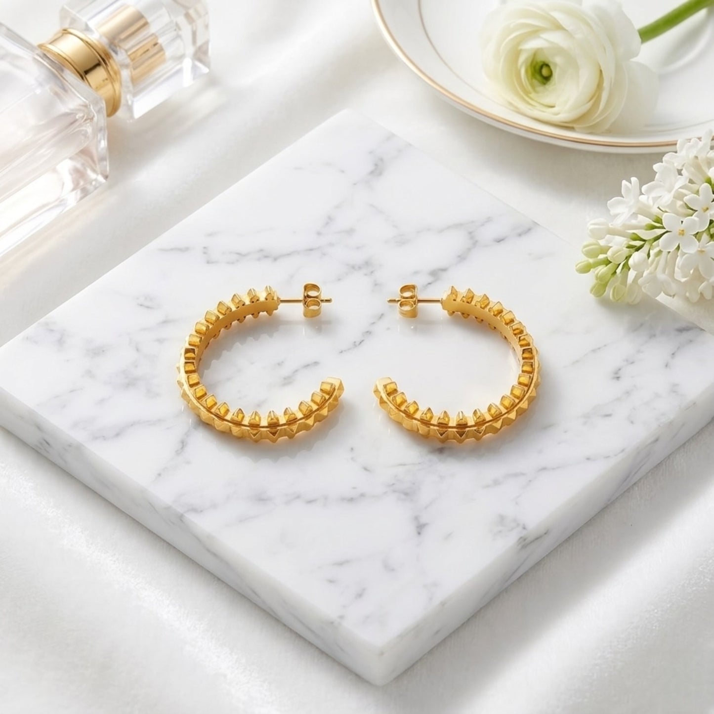 BEHI Isla Earrings | 18k PVD gold-plated stainless steel hoop earrings featuring pyramids design | Waterproof, hypoallergenic and tarnish-free | Shiny gold color