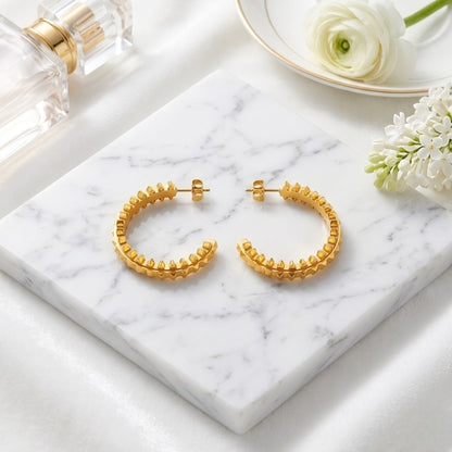 BEHI Isla Earrings | 18k PVD gold-plated stainless steel hoop earrings featuring pyramids design | Waterproof, hypoallergenic and tarnish-free | Shiny gold color