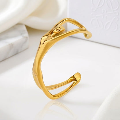 BEHI Devika Slim Bracelet | 18k PVD gold-plated stainless steel cuff bracelet with an abstract woman body design | Waterproof, Hypoallergenic and tarnish-free | Shiny gold finish