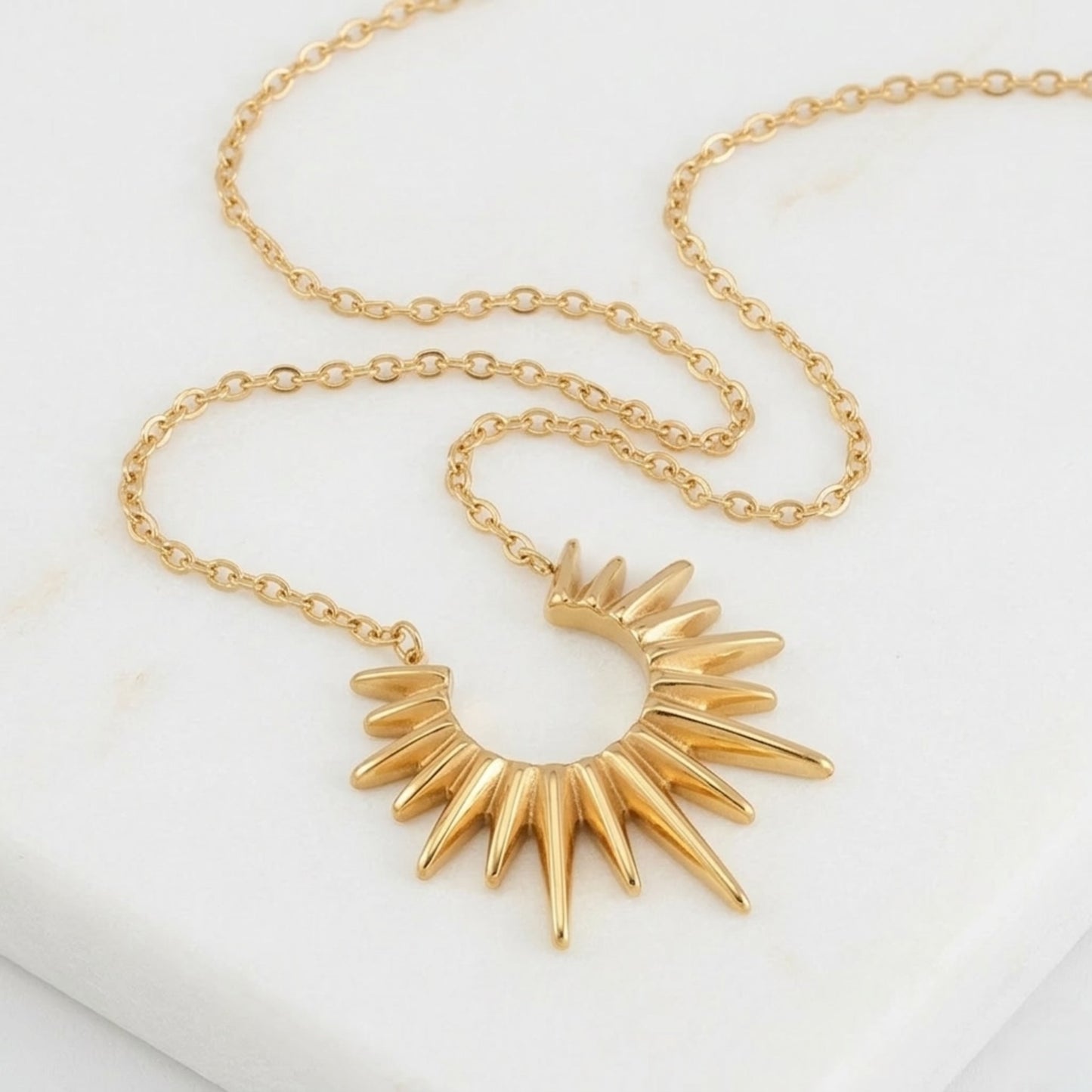 BEHI SUN STAR necklace with a sun-shaped pendant 18k gold plated stainless steel PVD coating