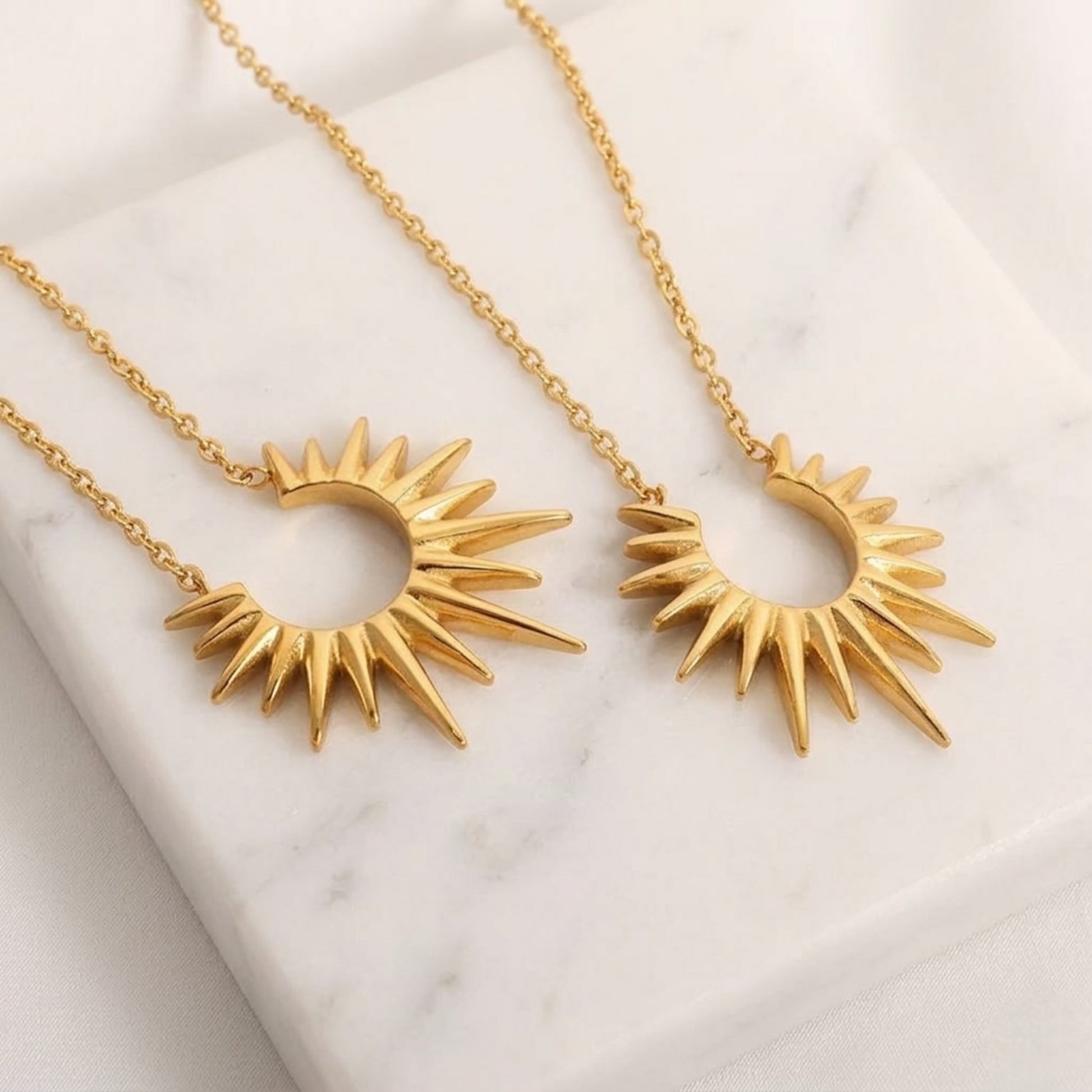 BEHI SUN STAR necklace with a sun-shaped pendant 18k gold plated stainless steel front and back