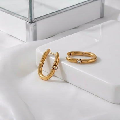 BEHI Eva Earrings | 18k PVD gold-plated stainless steel hoop earrings with a single clear Zircon gemstone set at the center of each hoop | Waterproof, Hypoallergenic and Tarnish-free