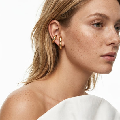A profile view of the waterproof BEHI Petra Earrings, featuring a bold, tarnish-free design.