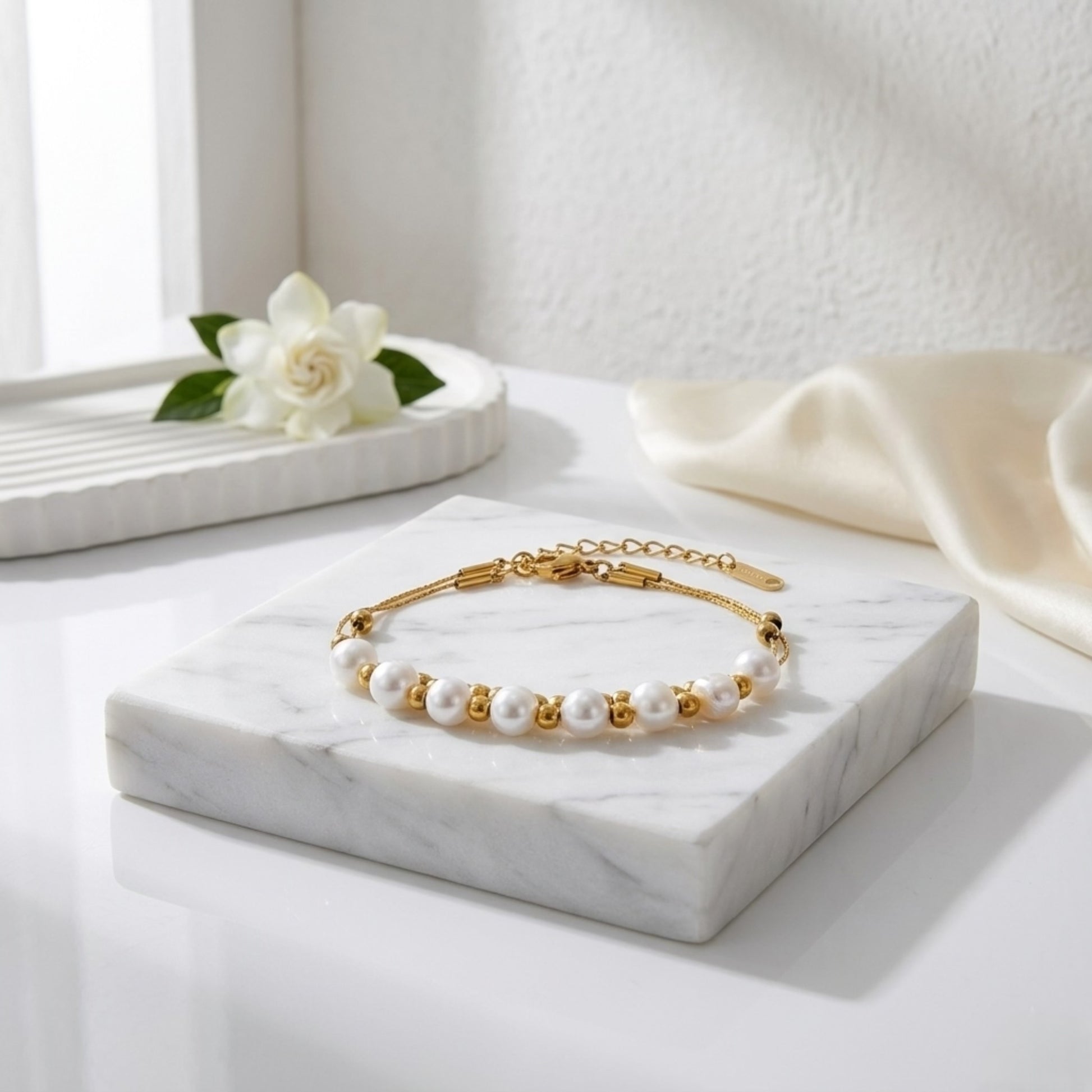 BEHI Tesa Bracelet | 18k PVD gold-plated stainless steel | featuring a string of round natural pearls with gold beads, adjustable chain | Waterproof & Hypoallergenic