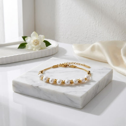 BEHI Tesa Bracelet | 18k PVD gold-plated stainless steel | featuring a string of round natural pearls with gold beads, adjustable chain | Waterproof & Hypoallergenic