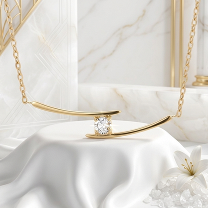 BEHI Alison Necklace on a clean minimalist surface, demonstrating how the gold-plated bar catches the light.