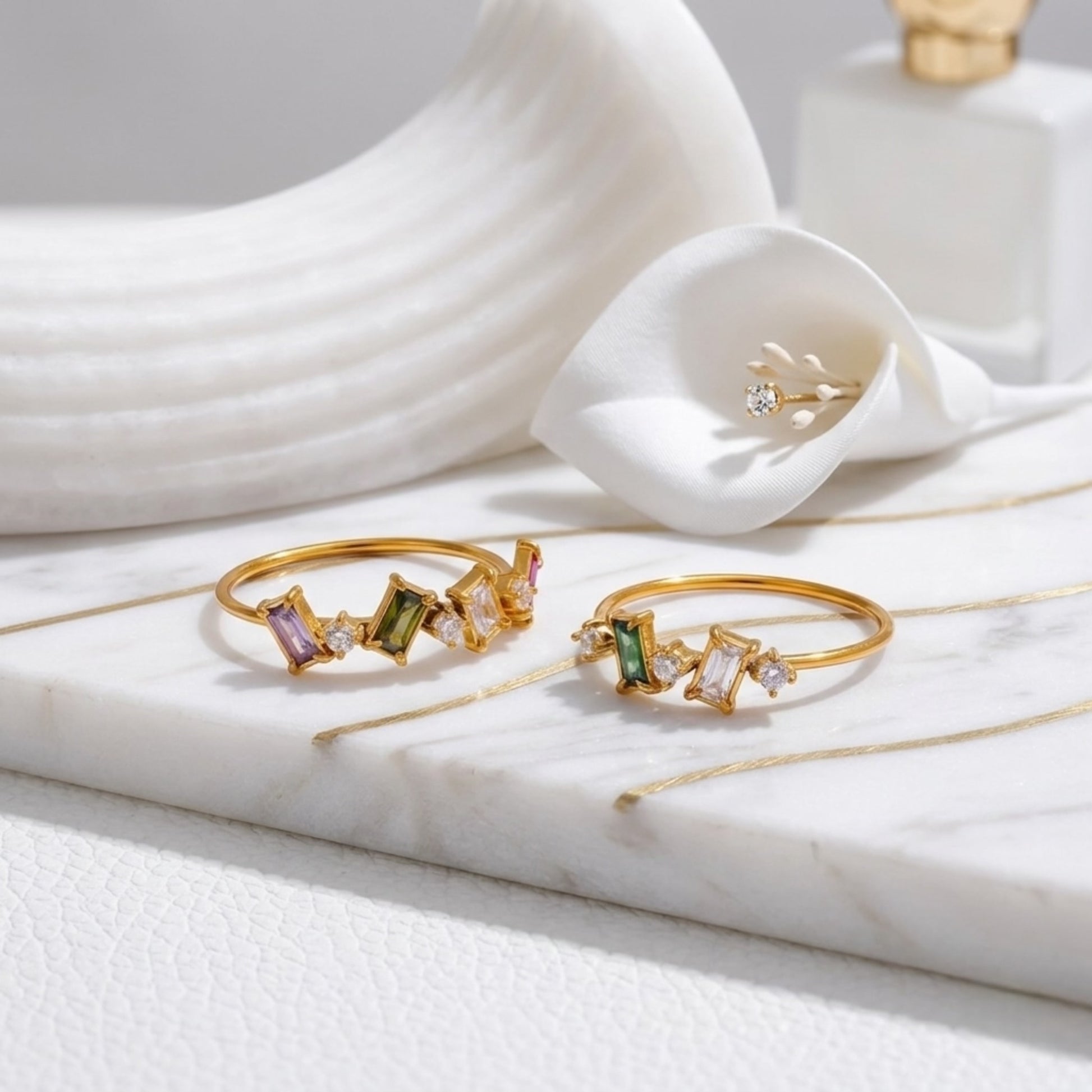 BEHI Melly Ring showing the architectural setting of the rectangular and colorful zircons.
