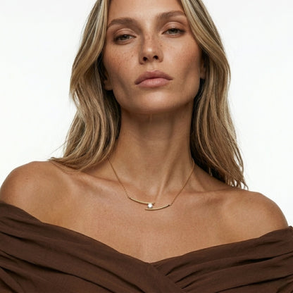 BEHI Alison Necklace styled for a modern, minimalist look, demonstrating the radiant tarnish-free gold brilliance.