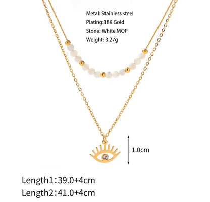 BEHI Viska Necklace | 18k PVD gold-plated stainless steel | layered necklace with white MOP stones and a gold eye pendant with a zircon stone in the center | Dimensions and specs