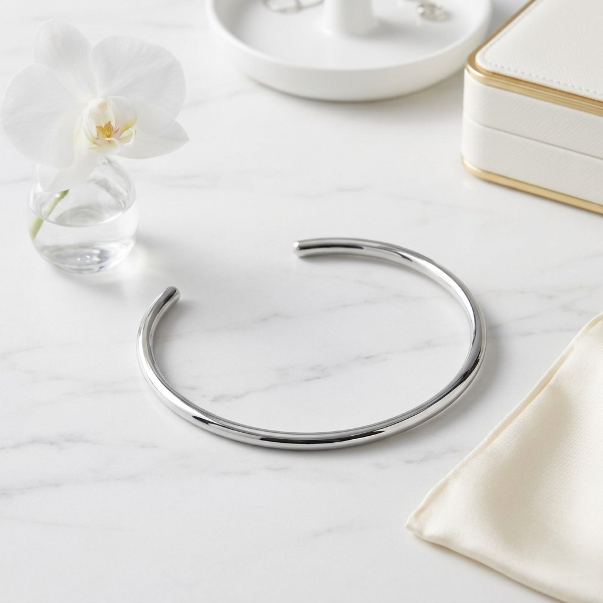 BEHI Flavia Choker in a sleek silver-tone finish, highlighting its waterproof and tarnish-resistant properties.