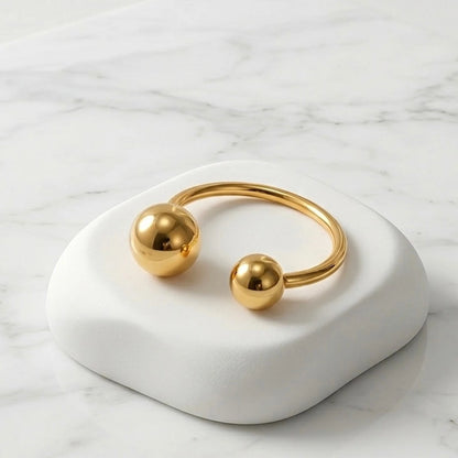BEHI MILANO Adriana Ring angled view — adjustable open band gold ring, 18k PVD-coated stainless steel, tarnish-free minimalist jewelry