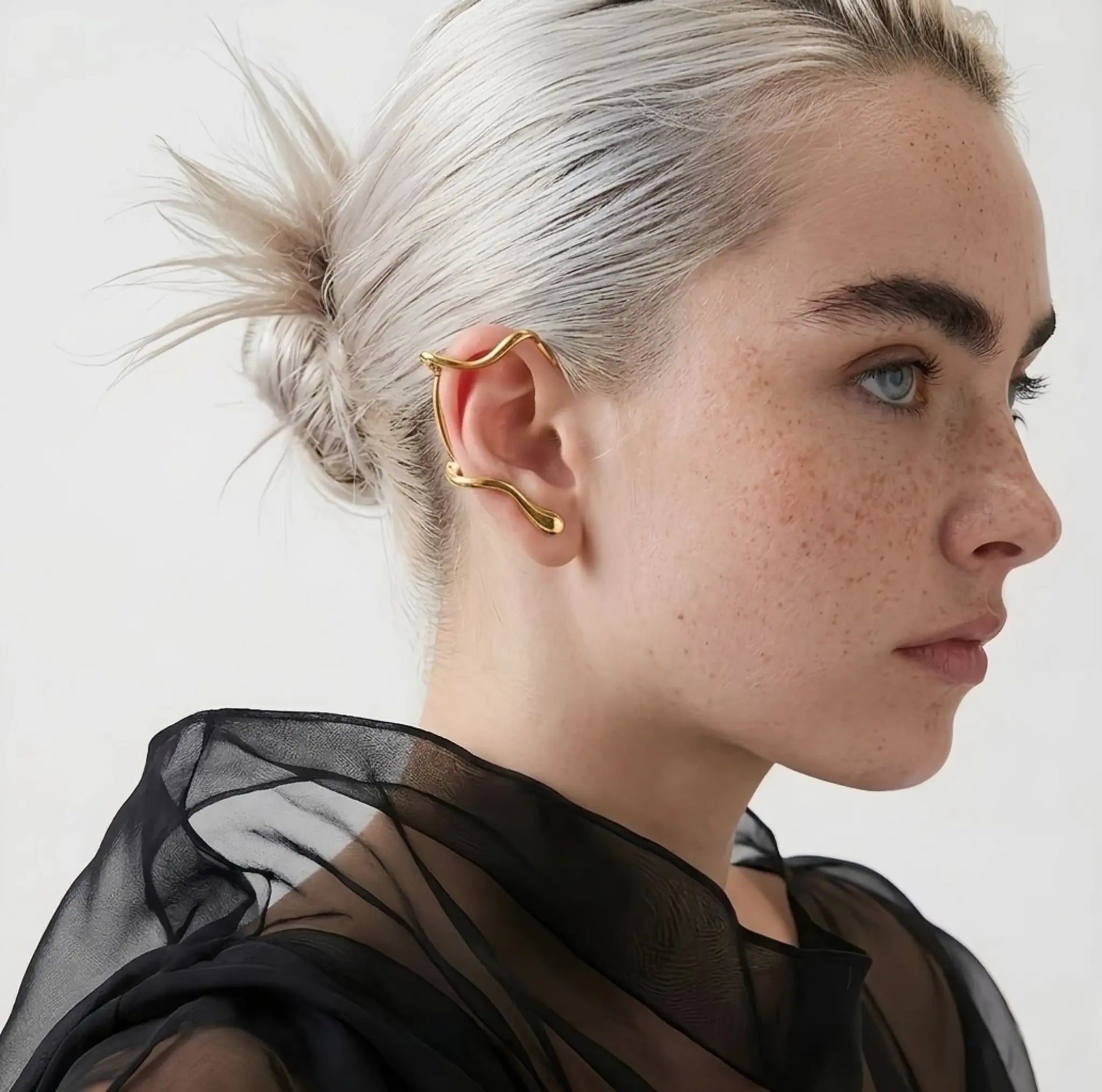 BEHI MILANO Afrodite Ear Cuffs worn on model — sculptural gold wrap ear cuff, no-piercing earring, 18k gold-plated statement jewelry