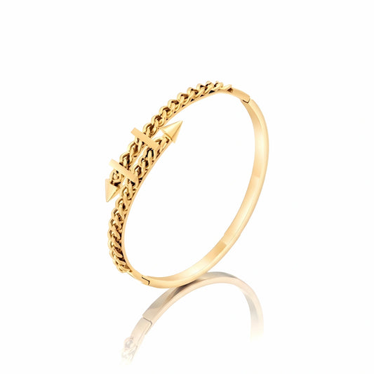 BEHI MILANO Alane Bracelet gold — 18k gold-plated bangle with curb chain and spike detail, waterproof tarnish-free stainless steel, white background