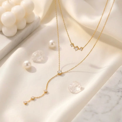 BEHI MILANO Alda Necklace — layered gold chain necklace with three-stone zircon bar and long Y-drop pendant, waterproof hypoallergenic jewelry