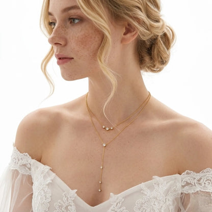 BEHI MILANO Alda Necklace worn on model — double-layer gold lariat with zircon Y-drop, 18k gold-plated stainless steel, bridal styling