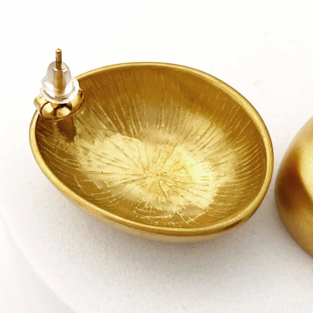BEHI MILANO Annarita Earrings — detail view of earring post backing and lightweight hollow interior design
