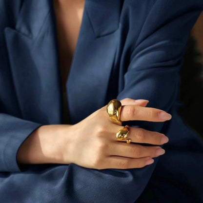 BEHI MILANO Archana Ring — close-up of model wearing gold architectural dome ring