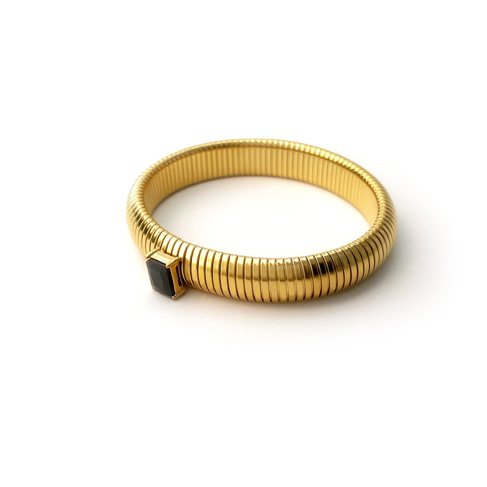 BEHI MILANO Beatriz Bracelet in Black — gold stretch cuff with black solitaire cubic zirconia gemstone