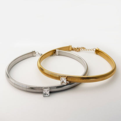 BEHI MILANO Beatriz Chokers — gold and silver solitaire ribbed chokers side-by-side