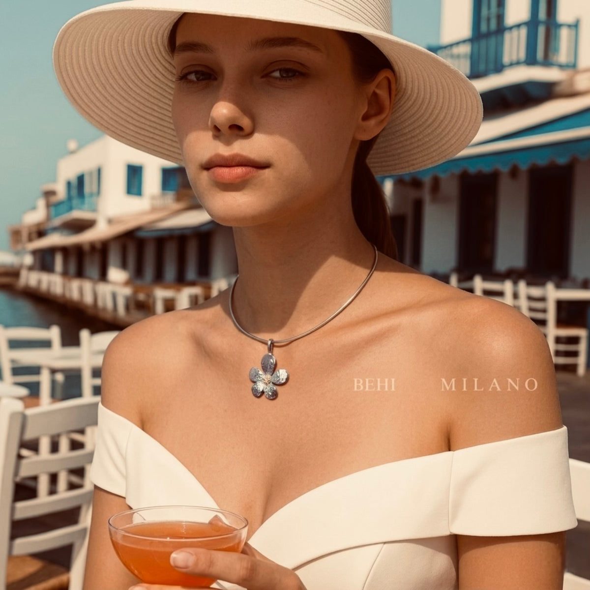 BEHI MILANO Bloom Choker — model wearing two-tone silver and gold flower choker with off-the-shoulder dress