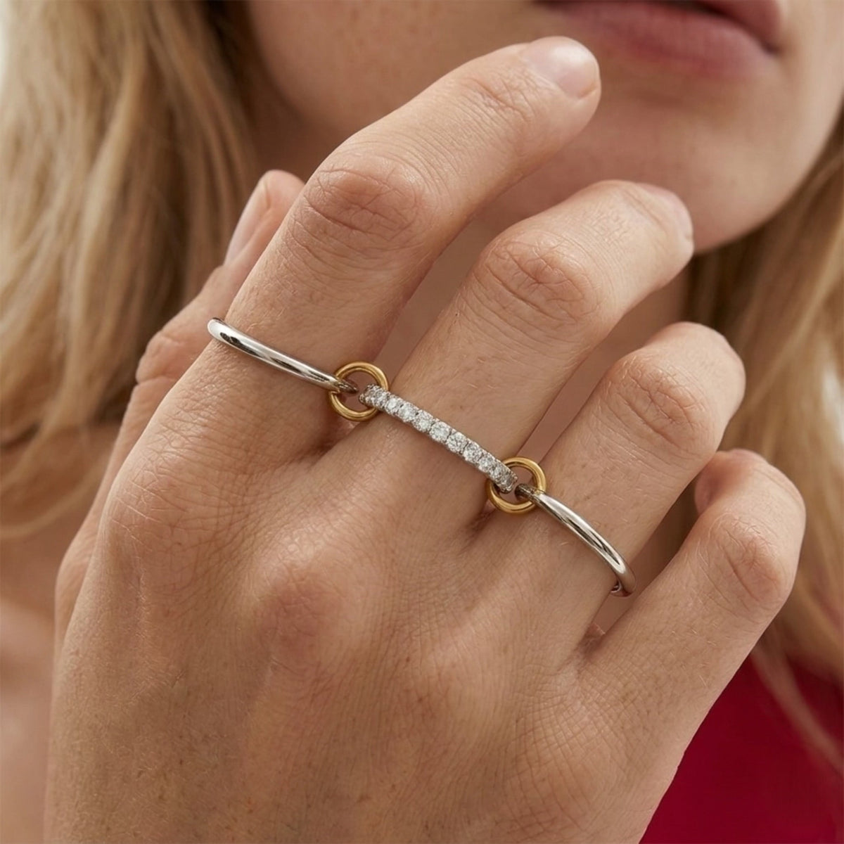 BEHI MILANO Carlita Ring — close-up of model hand wearing 3-band connected CZ ring across fingers