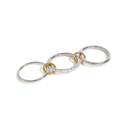 BEHI MILANO Carlita Ring — 3 connected silver rings with pave CZ and 18k gold link accents on white background