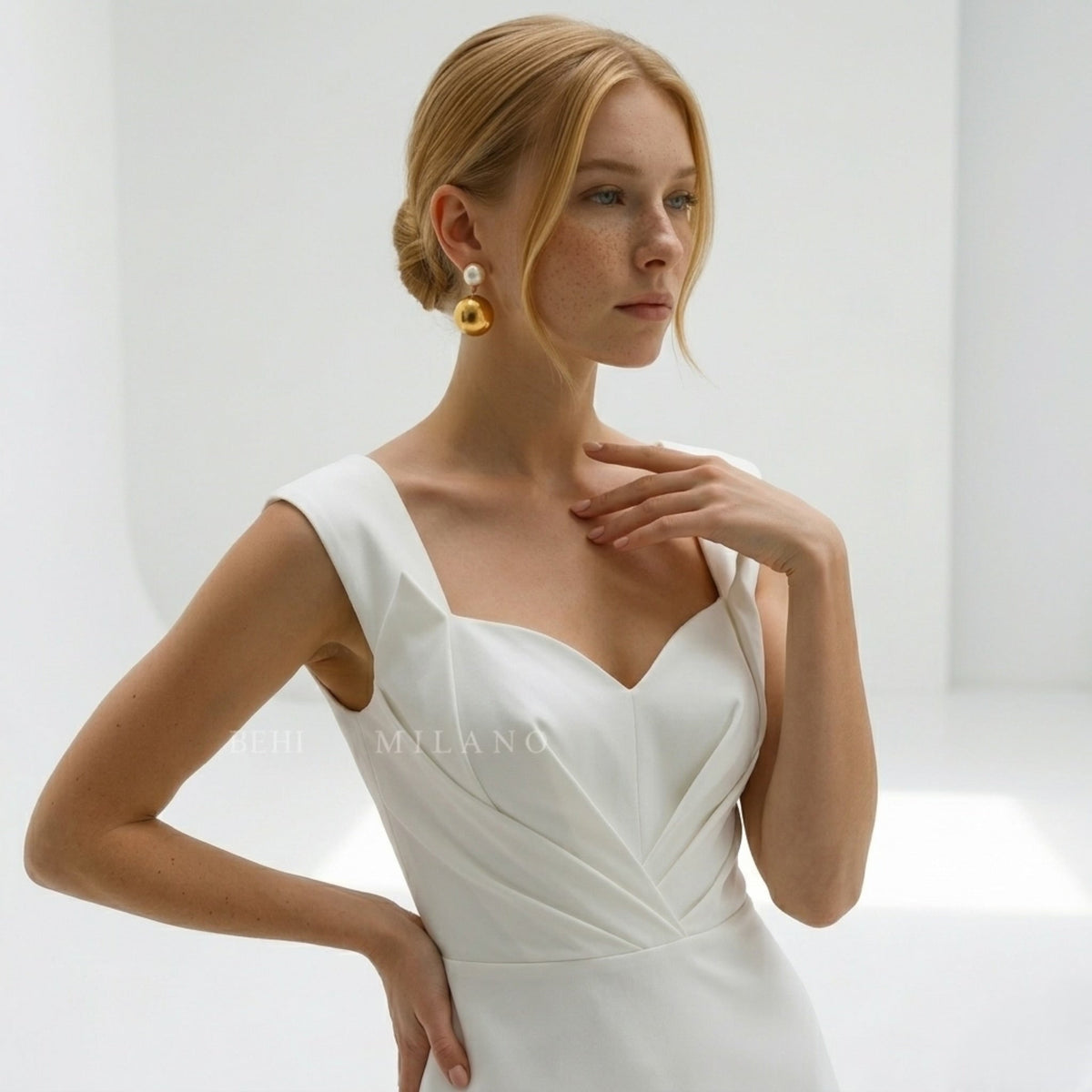 BEHI MILANO Carollina Earrings — model wearing 18k gold pearl cabochon and ball drop earrings with bridal gown