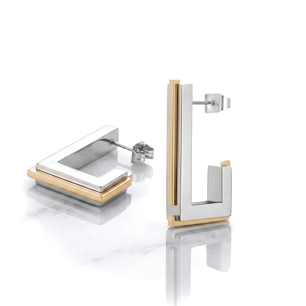 BEHI MILANO Cindy Earrings — two-tone silver and 18k gold architectural rectangular studs on white background