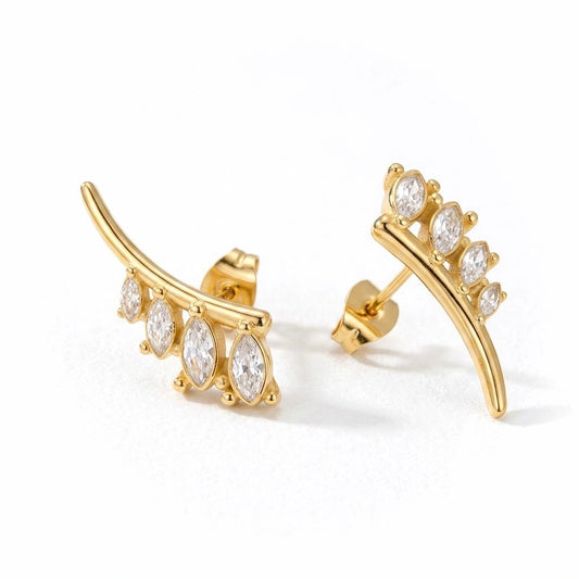 BEHI MILANO Dasha Earrings — 18k gold-plated zircon ear crawler studs on white background