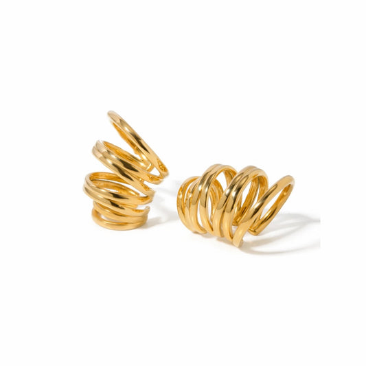 BEHI MILANO Denyse Ear Cuffs — 18k gold-plated multi-wrap spiral ear cuffs on white background