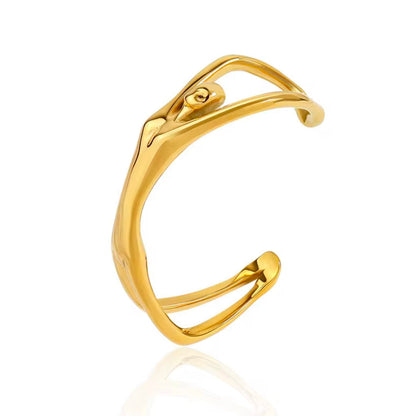 BEHI MILANO Devika Bracelet — 18k gold-plated abstract sculptural body cuff bracelet on white background
