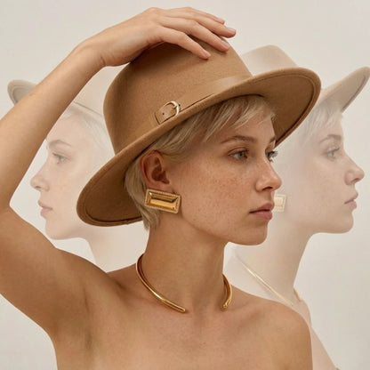 BEHI MILANO Dezi Earrings — multi-angle portrait of model displaying gold rectangular studs
