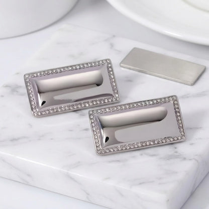 BEHI MILANO Dezi Earrings — silver stainless steel rectangular statement studs with crystal trim on marble