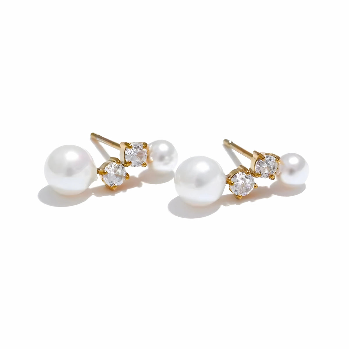 BEHI MILANO Diana Earrings — flat view of gold pearl and cz drop studs on white background