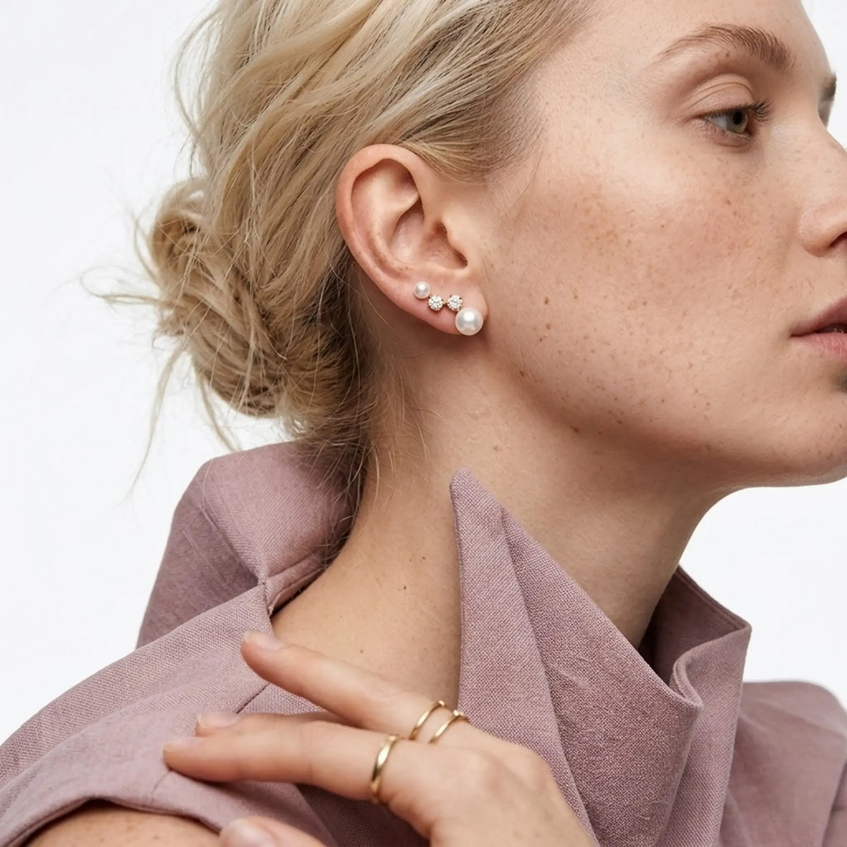 BEHI MILANO Diana Earrings — model wearing gold pearl and cz zircon drop studs with mauve top