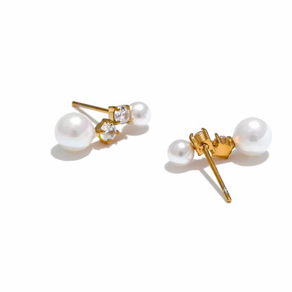 BEHI MILANO Diana Earrings — detailed pair shot showing gold PVD finish, zircons, and pearl drops