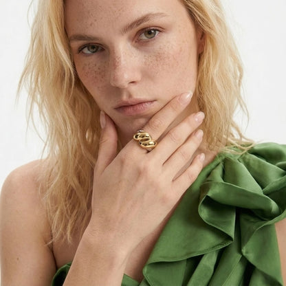 BEHI MILANO Disha Ring — close-up portrait of model wearing two-tone sculptural dome ring