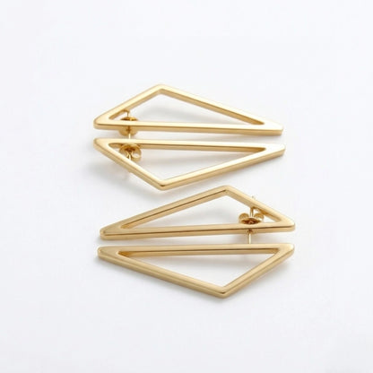 BEHI MILANO Elif Earrings — pair of gold geometric frame earrings displayed side by side