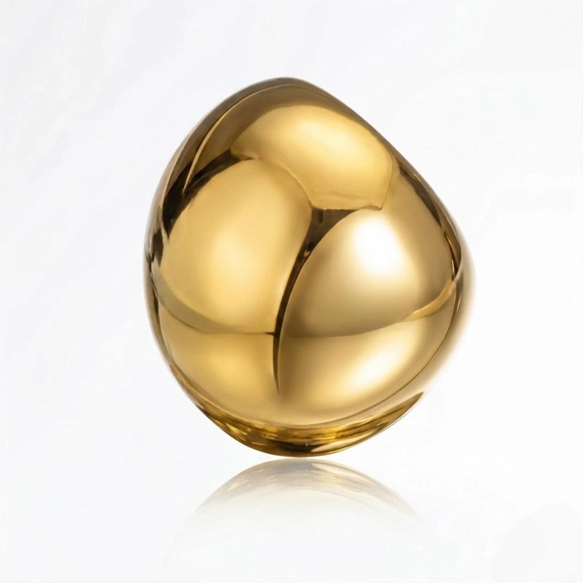 BEHI MILANO Elika Ring — reflective gold orb dome ring on white surface