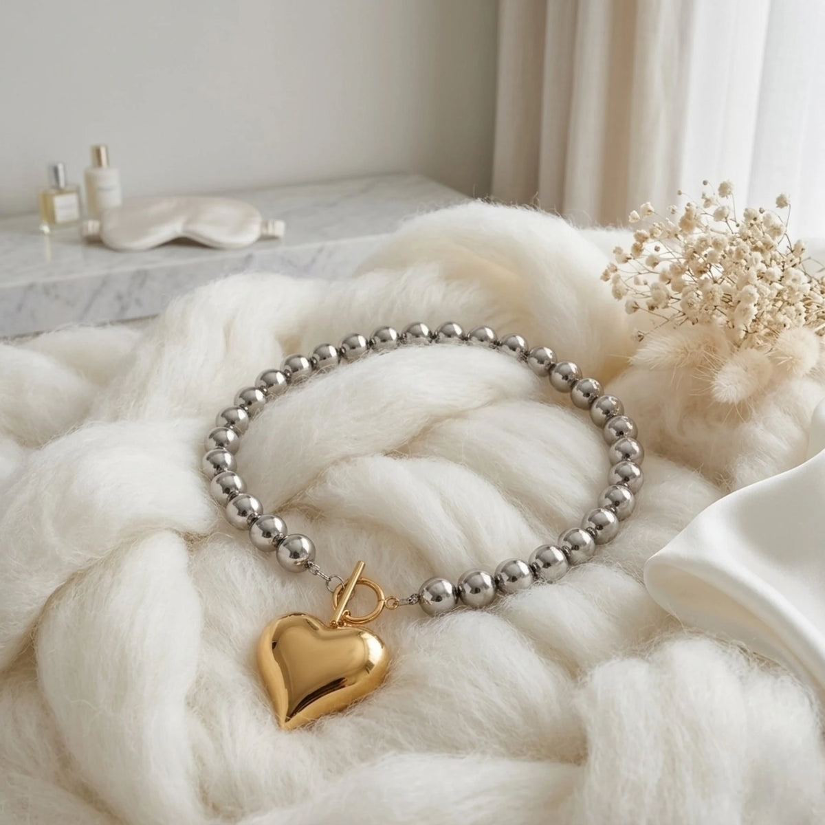 BEHI MILANO Emma Choker — silver beaded choker with gold heart charm on soft white fleece