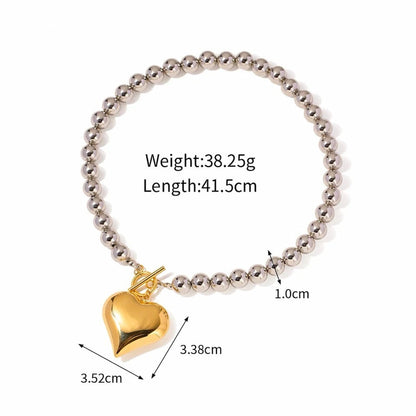 BEHI MILANO Emma Choker technical diagram showing 41.5cm length, 1.0cm beads, and 3.52cm by 3.38cm gold heart charm