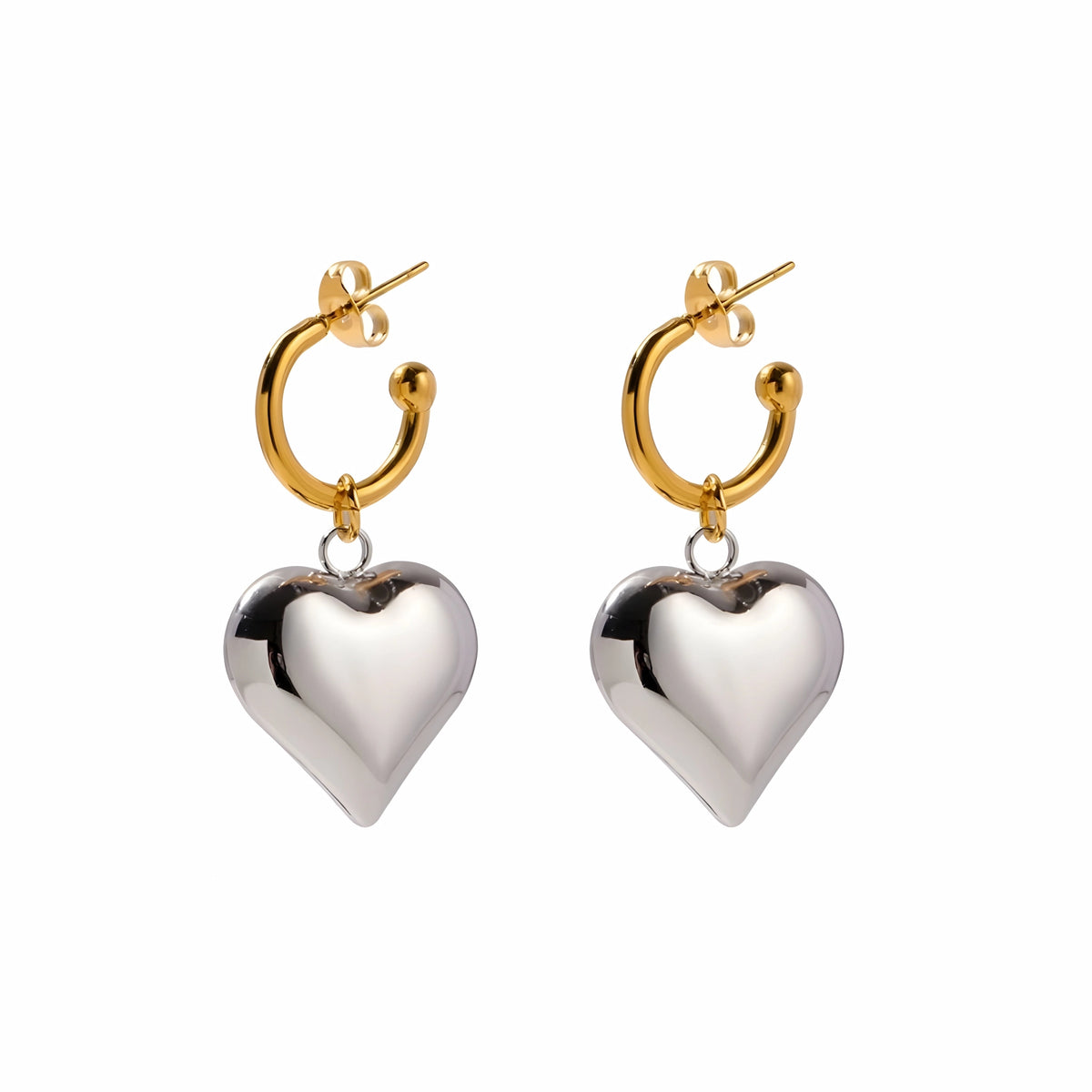 BEHI MILANO Emma Earrings — gold hoop earrings with silver puffy heart drop charms on white background