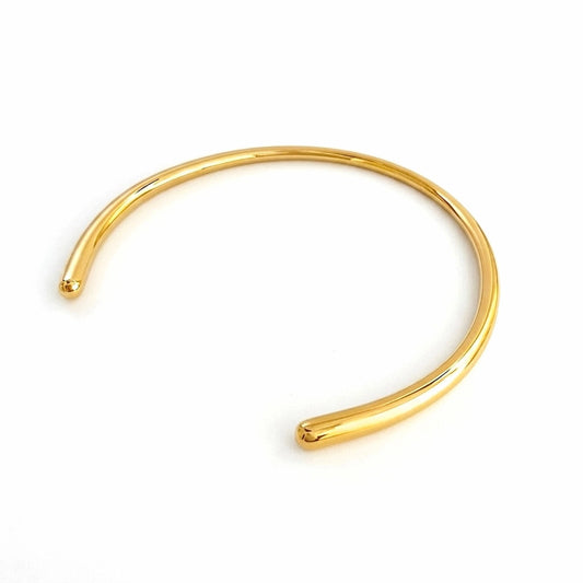 BEHI MILANO Flavia Choker — 18k gold open collar necklace with rounded tips on white background